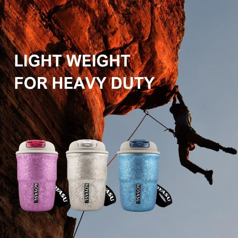 KOYASU 12oz titanium-lined mug – rose, gray, and blue – displayed against a rock climbing scene, highlighting lightweight durability for outdoor adventures.